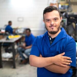 Young man with developmental disabilities who developed communication skills for wrkplace.