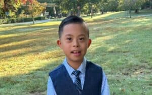 Little boy at the park learning new vocabulary.