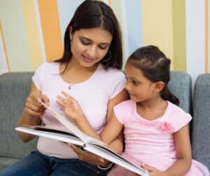 Mother and daughter reading together.