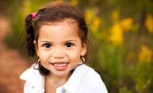 Two-year-old little girl smiling.